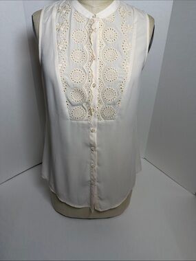 Maeve by Anthropologie sleeveless Top featuring intricate Marguerite embroidery